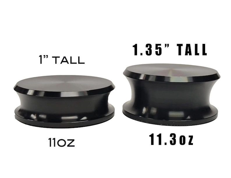 Side-by-side aluminum record weights showing the 1-inch and 1.35-inch profiles